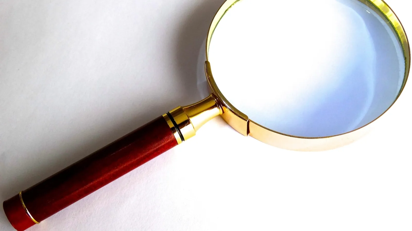 A magnifying glass on a white background