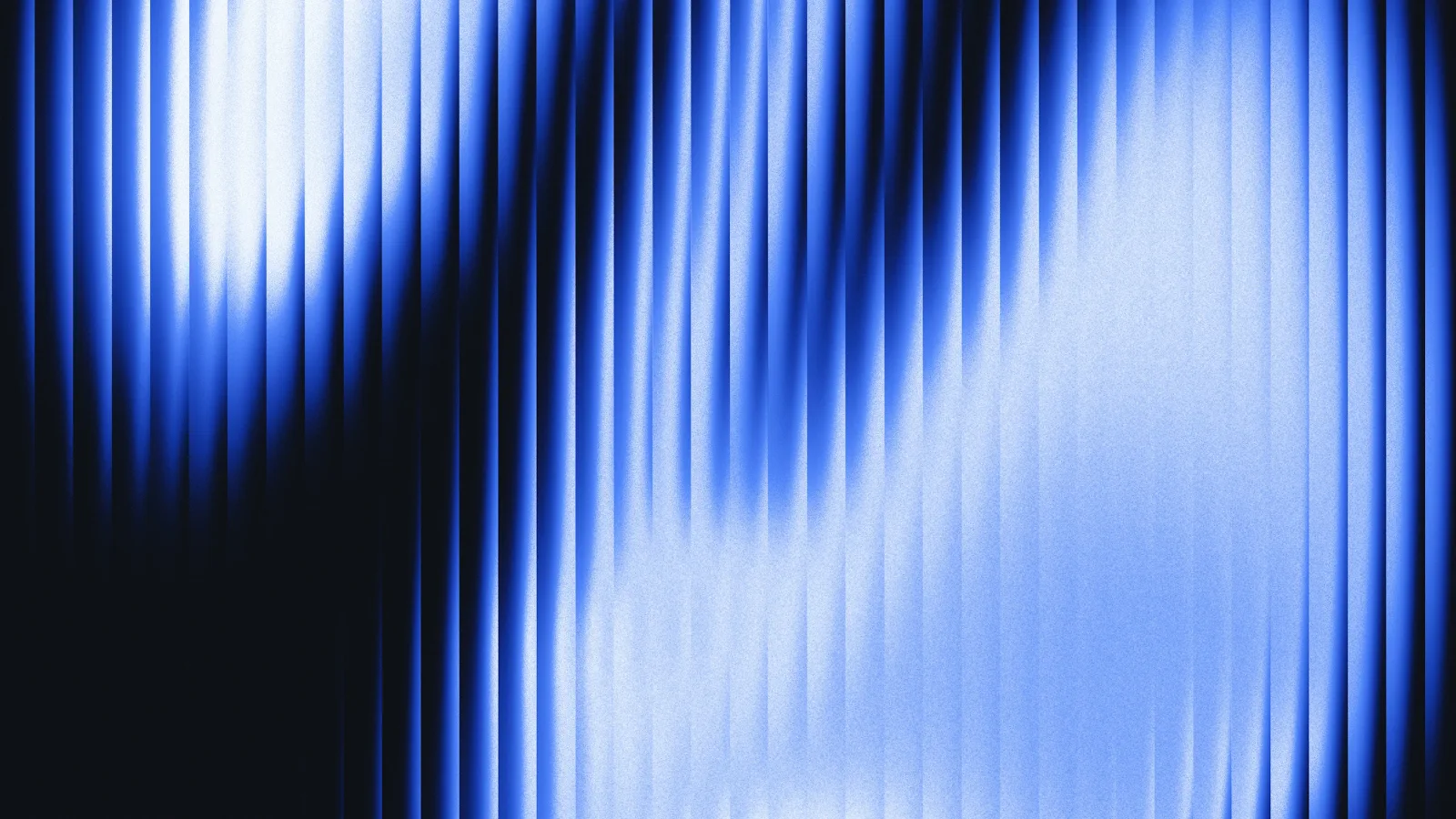 Blue light blurred behind ribbed glass